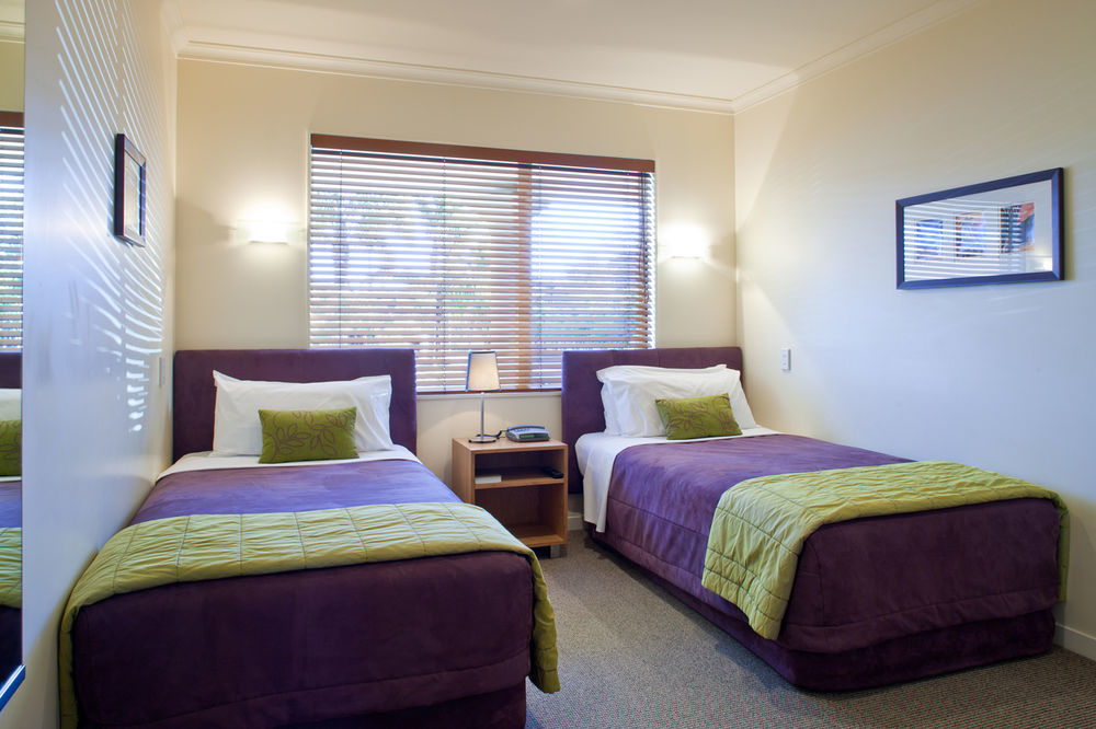 Regal Palms Resort Rotorua Exterior foto A typical bedroom at the hotel
